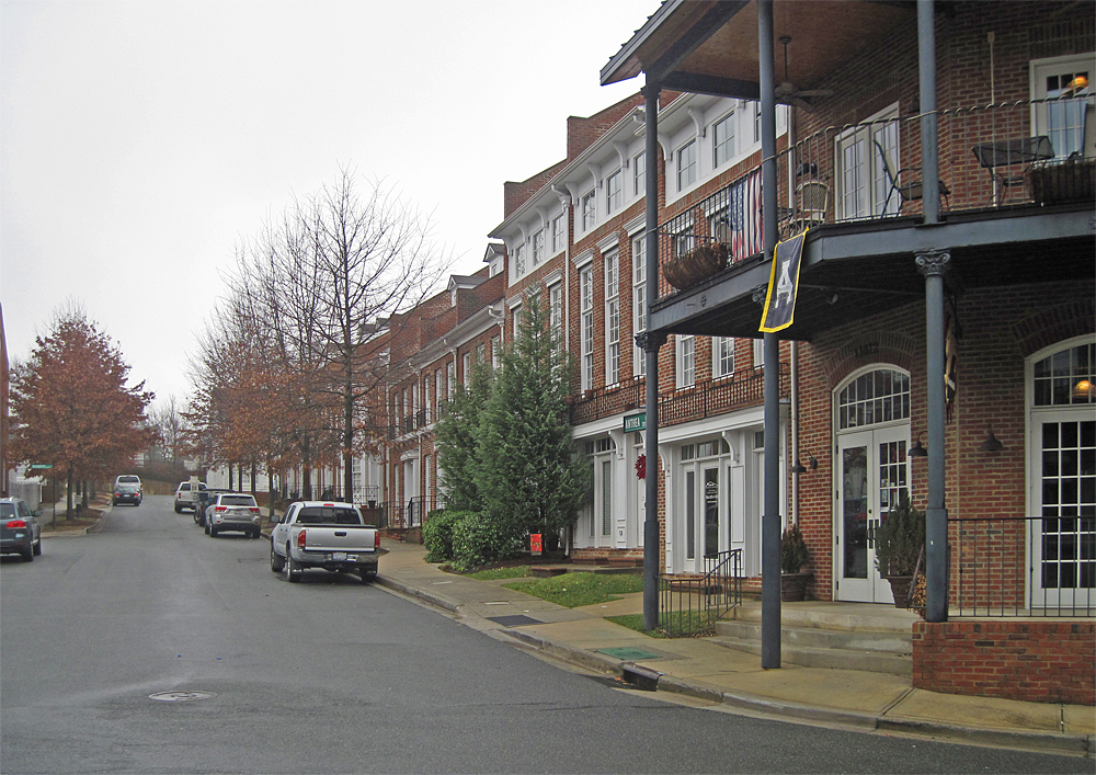 Vermillion town square streetscape in Huntersville Brick buildings with balconies along the town square streetscape in Vermillion, Huntersville